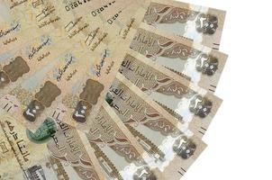 200 UAE dirhams bills lies isolated on white background with copy space stacked in fan shape close up photo