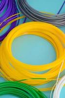 Plastic PLA and ABS filament material for printing on a 3D pen or printer of various colors photo
