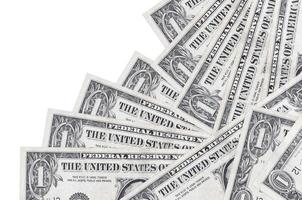 1 US dollar bills lies in different order isolated on white. Local banking or money making concept photo