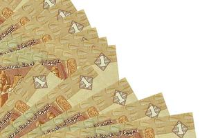 1 Egyptian pound bills lies isolated on white background with copy space stacked in fan close up photo