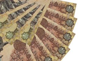 1 Egyptian pound bills lies isolated on white background with copy space stacked in fan shape close up photo