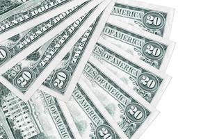 20 US dollars bills lies isolated on white background with copy space stacked in fan shape close up photo