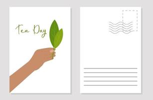 a mock-up of a greeting card with a tea day hand holding tea leaves vector