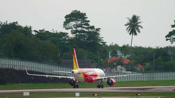 PHUKET, THAILAND NOVEMBER 26, 2017 - VietJet Airbus A320 HS VKB taxiing after landing at Phuket International airport video