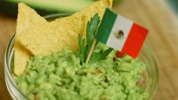 Guacamole salad with nachos and Mexican flag video