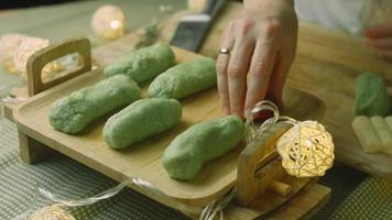 Cake with green dough, sour cherries and sour cream. It also has food ornament and the red star cake video