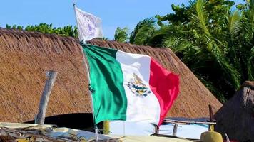 Mexican green white red flag on beautiful Holbox island Mexico. video