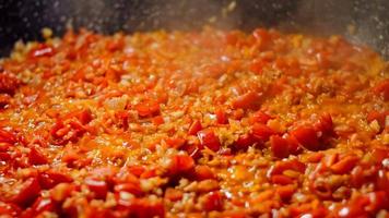 Fried eggs in Georgian cuisine, chirbuli. Eggs with tomatoes steaming in the pan video