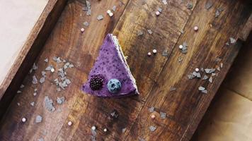 Provencal cake with blueberries and lavender on a wooden tray with decorations video