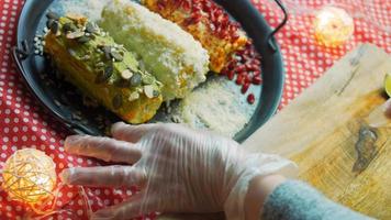 Mexican corn elote in three ways. Pressed with cheese, guacamole and pomegranate. Maxican flag video