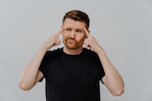 Man trying to make decision or find solution photo