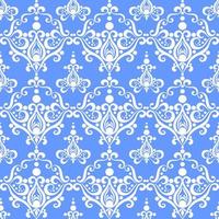 symmetrical seamless ornament tile of white graphic abstract elements on a blue background, texture, design photo