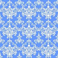 symmetrical seamless ornament tile of white graphic abstract elements on a blue background, texture, design photo