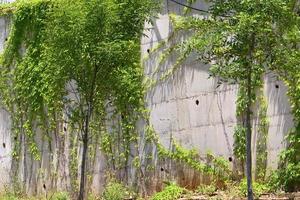 High wall made of stone and concrete. photo