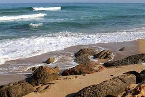 Stones on the shore of the Mediterranean Sea. photo