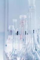 Laboratory glassware, test tubes and flasks for experiments and scientific discoveries. photo