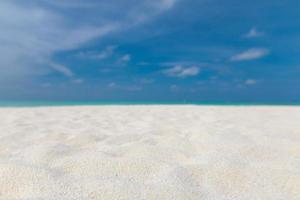 Empty sandy beach landscape near blue sea. Beautiful beach view, tropical scene photo