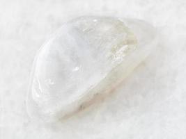 polished white moonstone adularia gem on white photo