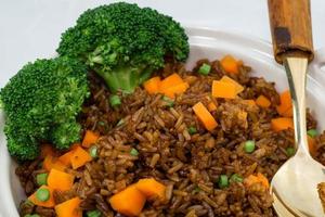 vegetable fried rice with broccoli carrot bean photo