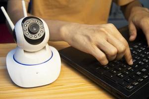 IP camera operator From the computer, set up the IP camera. photo