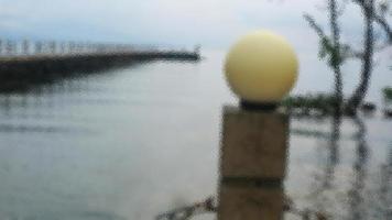 lights on the railing on the pier photo