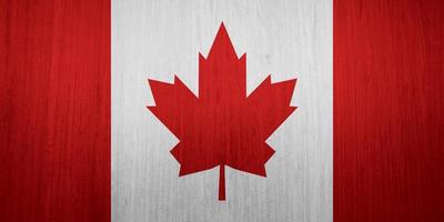 textura de la bandera canadiense como fondo foto