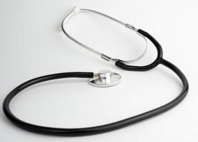 Doctor stethoscope on white background photo