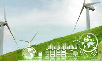 Wind energy. Sustainable and renewable energy. Wind turbines generate electricity. Windmill farm. Sustainable resources. Sustainable development. Rechargeable battery charging with green power concept photo