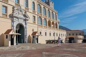 Monte Carlo - guard with Summer uniform walking in front of the Royal Palace photo