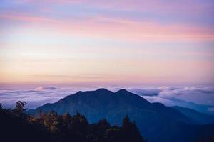 The background of nature with fog on the mountain. In the rainy weather in the countryside. winter photo