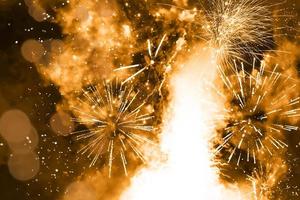 Abstract background. Gold-colored blur. Fireworks circle blur photo