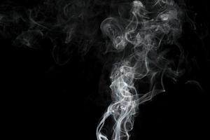 white smoke on black background photo