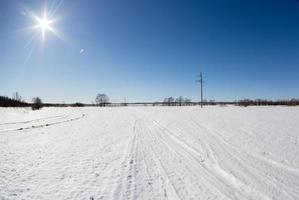 power lines against the blue sky in winter photo