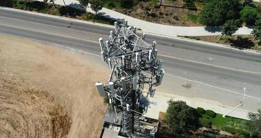 Aerial of Cellular Wireless Mobile Data Tower with Neighborhood Surrounding video