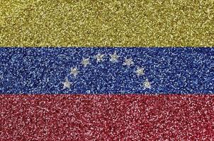 bandera de venezuela representada en muchas pequeñas lentejuelas brillantes. fondo colorido del festival para la fiesta foto