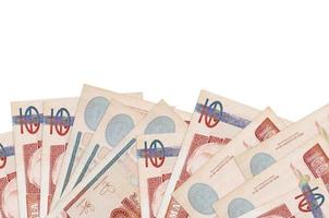 100 Guatemalan quetzales bills lies on bottom side of screen isolated on white background with copy space. Background banner template photo