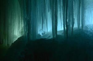 Large blocks of ice frozen waterfall or cavern background photo