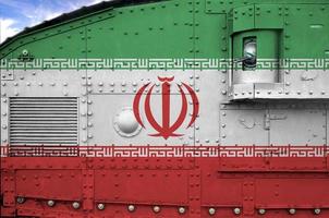 Iran flag depicted on side part of military armored tank closeup. Army forces conceptual background photo