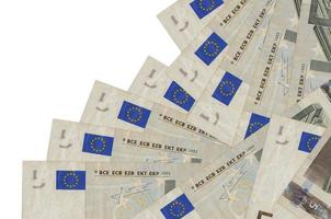 5 euro bills lies in different order isolated on white. Local banking or money making concept photo