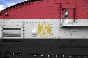 Egypt flag depicted on side part of military armored tank closeup. Army forces conceptual background photo