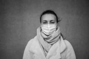 A picture of a girl in a mask. isolated Covid-19 pandemic. photo