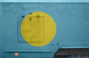 Palau flag depicted on side part of military armored truck closeup. Army forces conceptual background photo