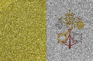 Vatican City State flag depicted on many small shiny sequins. Colorful festival background for party photo