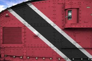 Trinidad and Tobago flag depicted on side part of military armored tank closeup. Army forces conceptual background photo