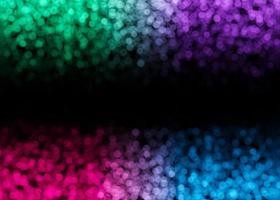 Colorful bokeh lights on black background. Copy space for your text. Abstract backdrop. Festive, celebration. Boke effect. Small out-of-focus neon light parts. Lower and upper frame, border. photo