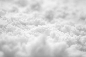 vista de ángulo alto de fondo de textura de nieve blanca foto