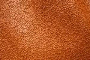 Brown leather texture background close up photo