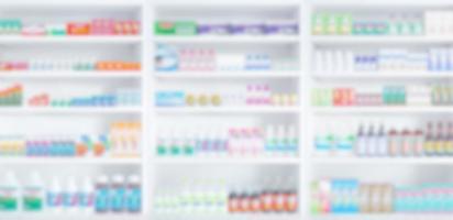 pharmacy drugstore shelves blur pharmaceutical medicine product background photo