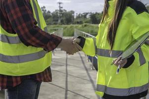 Environmental engineers work at wastewater treatment plants,Water supply engineering working at Water recycling plant for reuse,Technicians and engineers discuss work together. photo