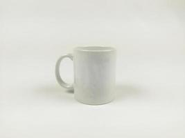 mock up mug. Template of a white mug on the white background photo